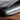 Two leather laptop sleeves