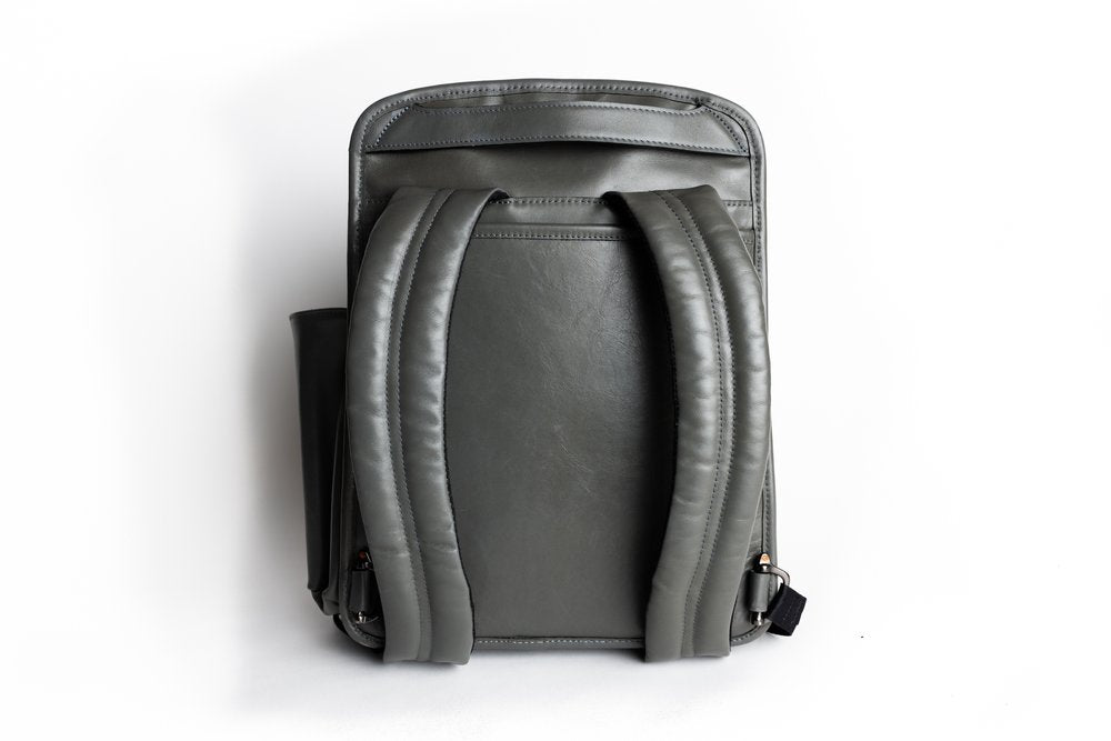 Gray leather backpack back view.