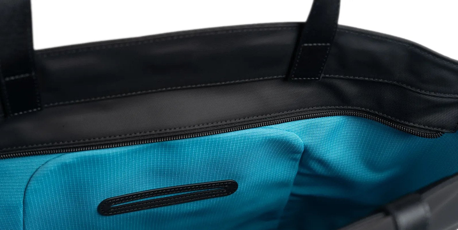 Black Asset tote, top opening with the backup zipper along the lip